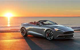 Coche Aston Martin, puesta del sol, costa