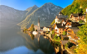 Austria, Hallstatt, Salzkammergut, casa, lago, montañas, rayos de sol HD fondos de pantalla