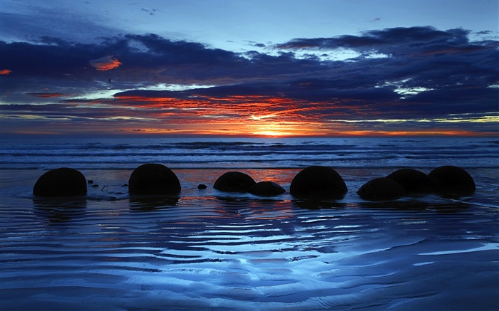 Cantos rodados de Moeraki, Koekohe Playa, mar, puesta del sol, Isla Sur, Nueva Zelanda Fondos de pantalla, imagen