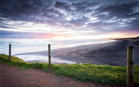 Muriwai playa, puesta del sol, Auckland, Nueva Zelanda