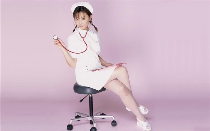 enfermera linda que se sienta en la silla Fondos de pantalla, imagen