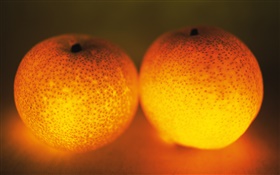 fruta luz, dos naranjas