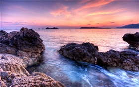 Costa, rocas, puesta de sol